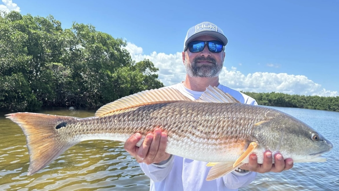 Moment from a fishing charter on Tampa Bay