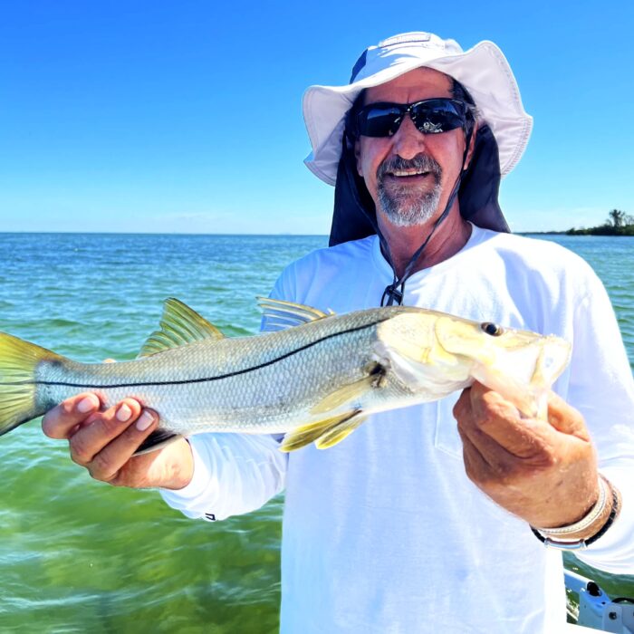 Captain Gavin holding a snook