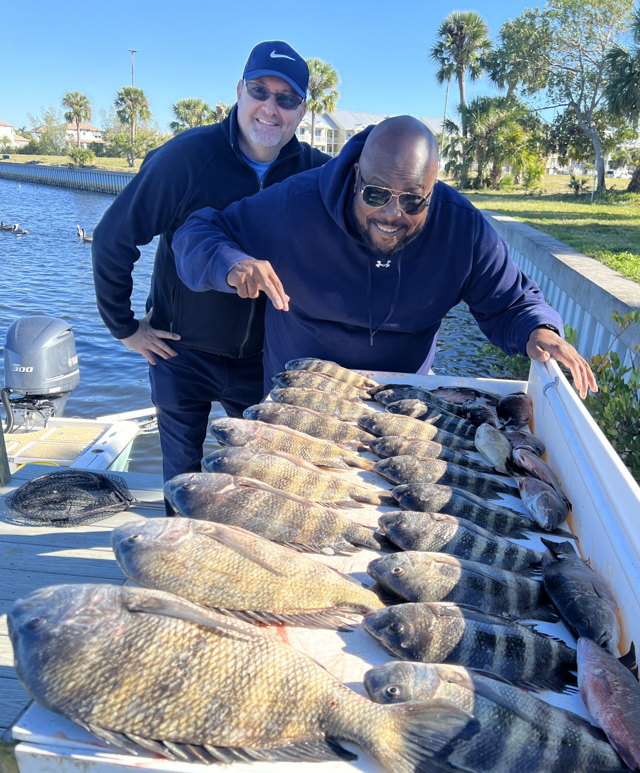 Guests fishing Tampa Bay in winter with Captain Gavin